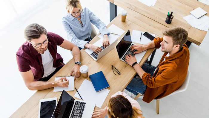 Four Friends Working on a Group Project