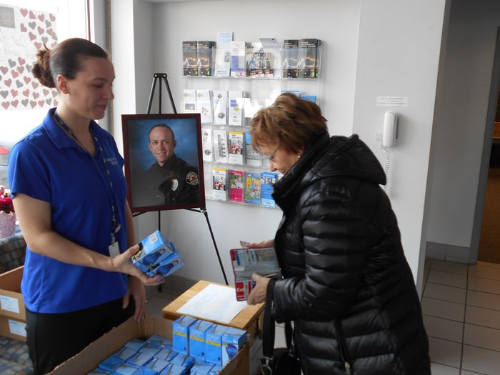 Handing out blue bulbs