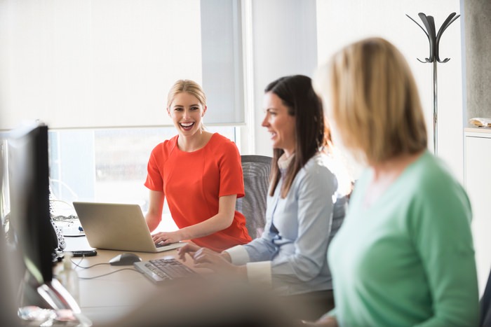 Colleagues in bright office