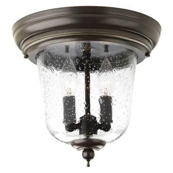 2 Light Antique Bronze with Clear Seeded Glass Wall Light Fixture