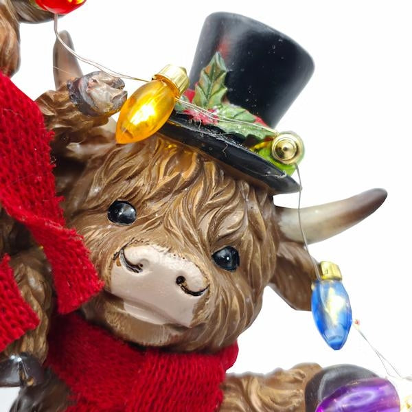 9.8" Highland Cow Family Christmas Figurine Set with Timer - Image 4