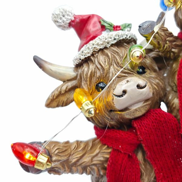 9.8" Highland Cow Family Christmas Figurine Set with Timer - Image 2