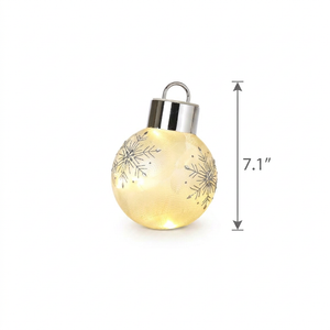 Ornament with a 7.1-inch height dimension on the right