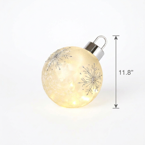 Ornament with an 11.8-inch height dimension on the right